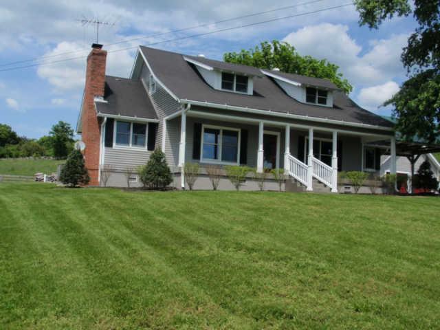 3235 Greenvale Road Watertown, TN 37184 - Photo 2 of 25 127 ACRES FENCED ACRS W 3258 SF-3 BR-3.5 BA - 2 CR GRG - WDBRN FP-2 A/C UNITS-BARN W/ 3 STALLS - CONCRETE FLR - SPRING FED LAKE 15' DEEP-FENCED