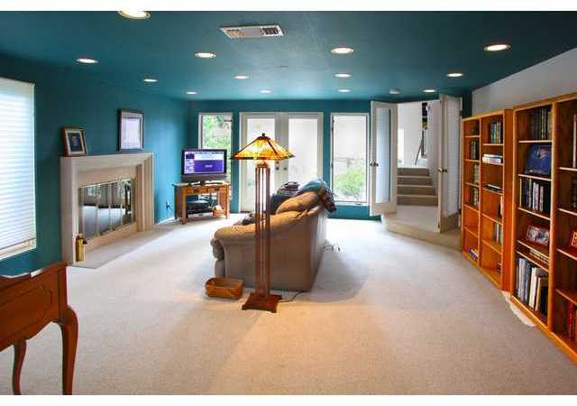 336 Pine Needles Drive Del Mar, CA 92014 - Photo 14 of 17 Family room with doors to pool/spa at one end and doors to private patio at the other.