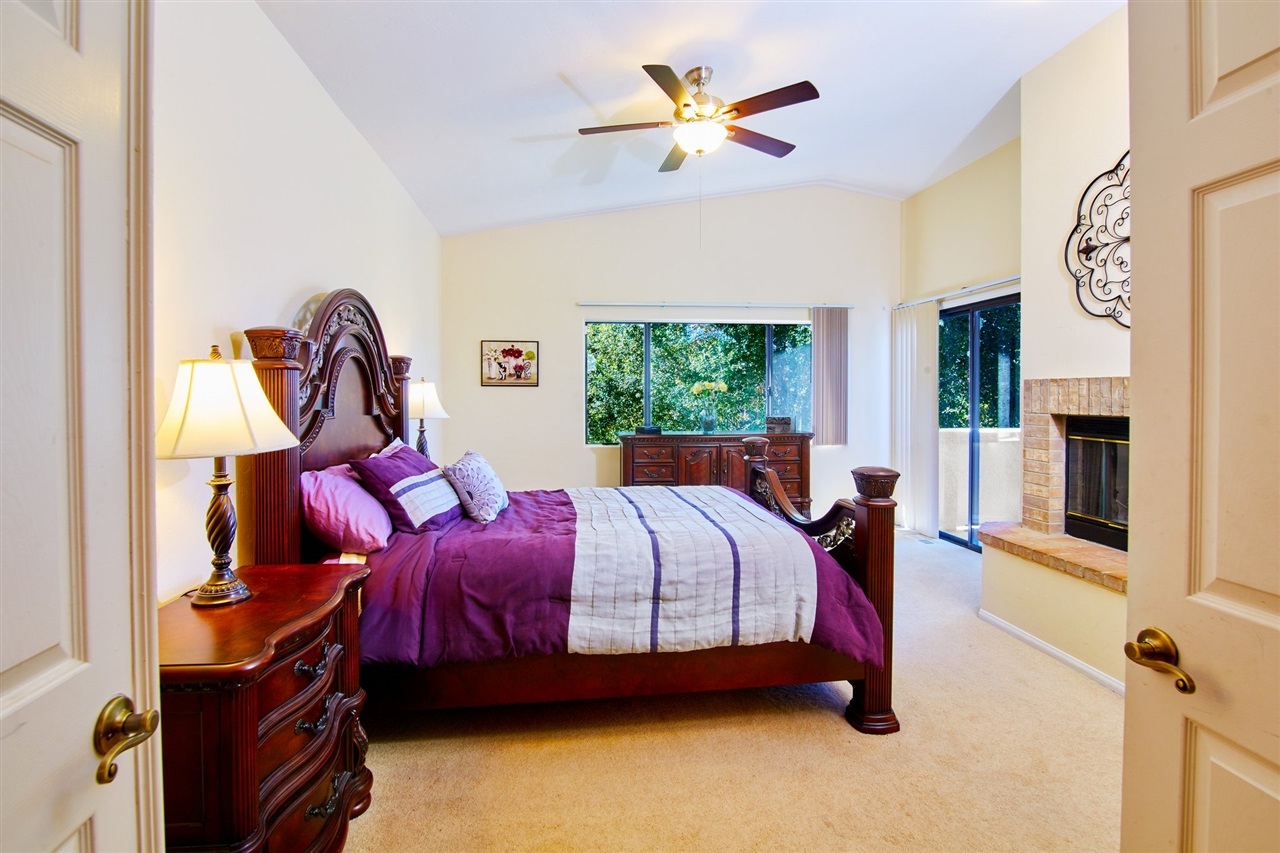 850 South Grade Road Alpine, CA 91901 - Photo 14 of 25 Spacious and relaxing, the master retreat offers fireplace, private deck, master bath and double door entry.