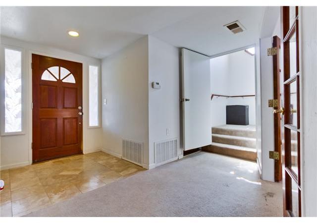 14164 Powers Road Poway, CA 92064 - Photo 4 of 25 Custom tiled entry way, stairs leadaing to upstairs bedroom