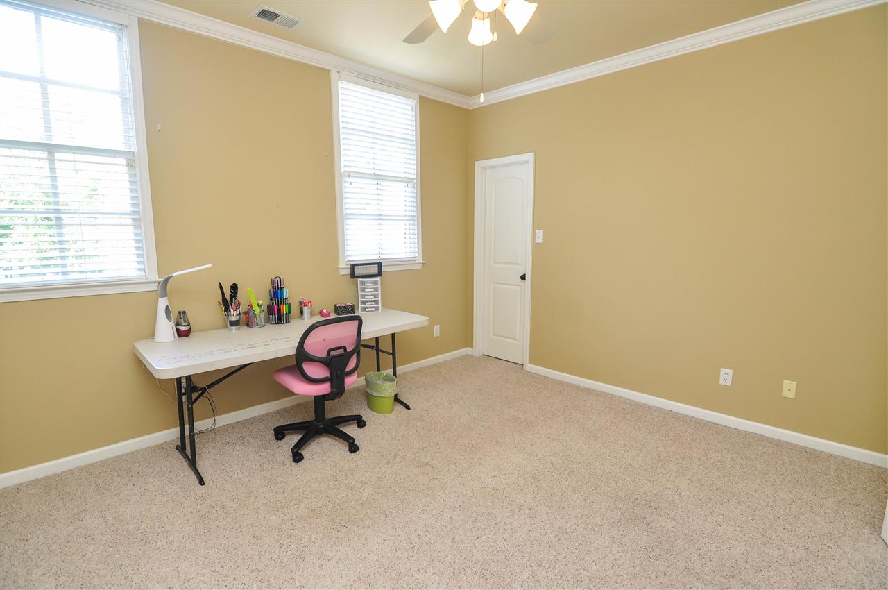 345 Windover Road Piperton, TN 38017 - Photo 16 of 25 The 3rd bedroom is upstairs and comes with carpet, high ceilings with fan, and large closet.