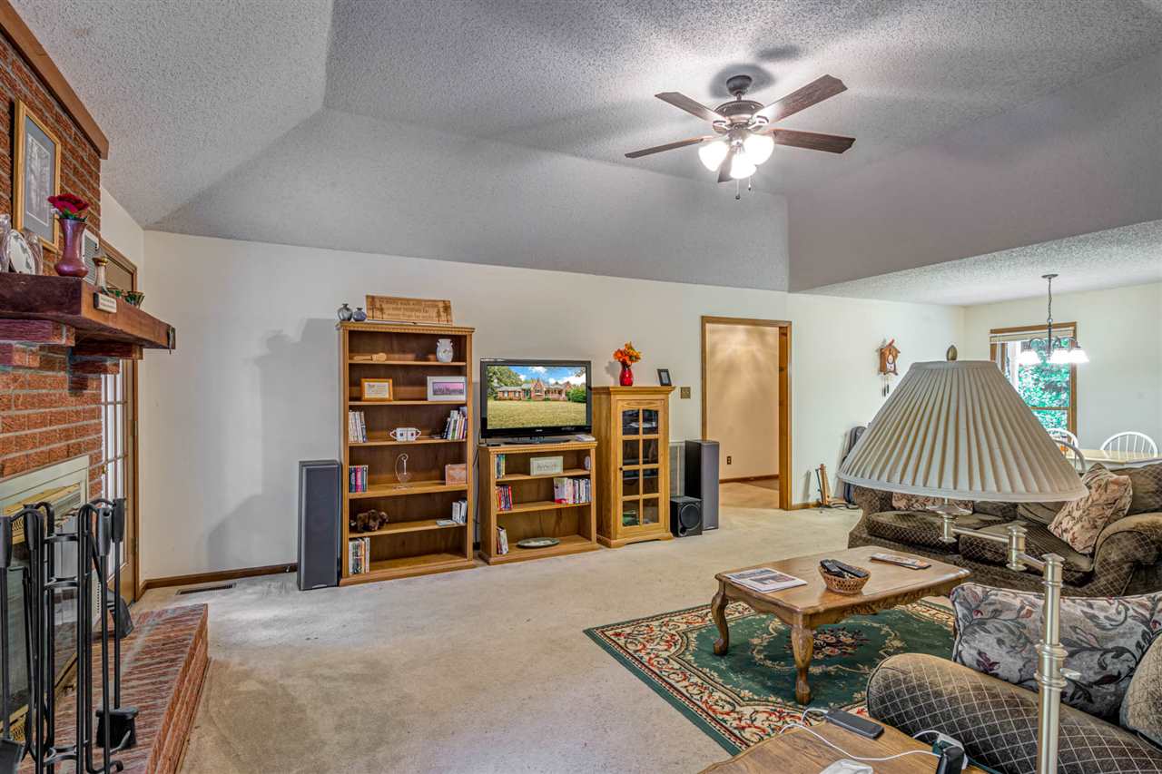 192 Liberty Church Smith Road Brighton, TN 38011 - Photo 9 of 25 Open plan Living and dining area, ceiling fan, carpeted