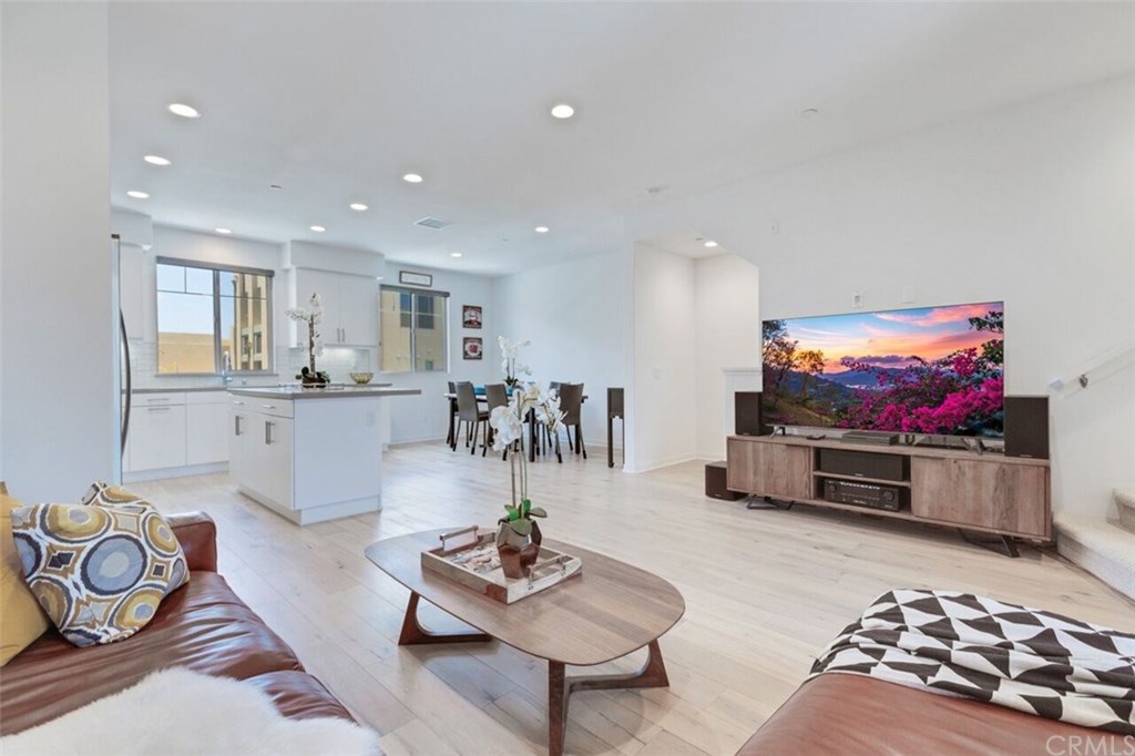 116 Cadence Irvine, CA 92618 - Photo 1 of 1 STUNNING OPEN LAYOUT FLOOR PLAN CONNECTING LIVING, DINING, KITCHEN, BALCONY ALL ONE LEVEL!