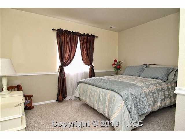 7943 Buschborn Road Peyton, CO 80831 - Photo 10 of 16 One of two additional bedrooms in the basement.