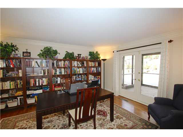 2288 Kirby Road Memphis, TN 38119 - Photo 13 of 25 Fabulous light filled living room has double glass doors leading to the screened porch.
