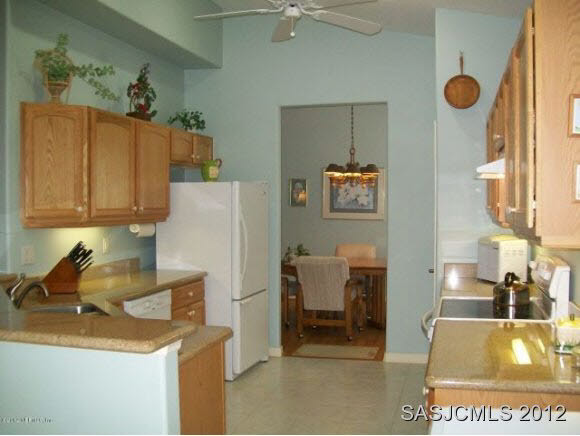 997 Ridgewood Lane St. Augustine, FL 32086 - Photo 7 of 19 Kitchen to Dining