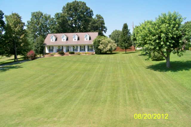 3034 New Hall Road Greenbrier, TN 37073 - Photo 2 of 30 Lush landscaping and mature Oaks makes this the perfect setting for this gorgeous family home.