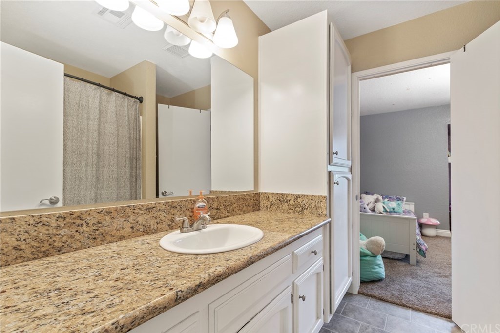 628 4th Street Paso Robles, CA 93446 - Photo 15 of 22 Good linen storage in the upstairs full bathroom