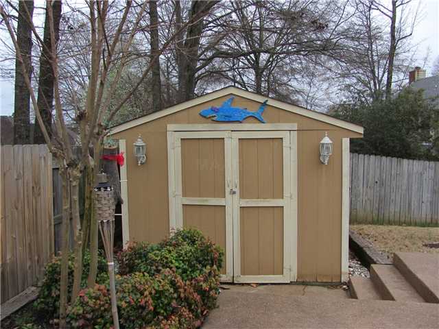 8869 Walnut Ridge Loop Memphis, TN 38018 - Photo 19 of 20 Shed in Backyard to hold all of your lawn equipment as well as pool equipment