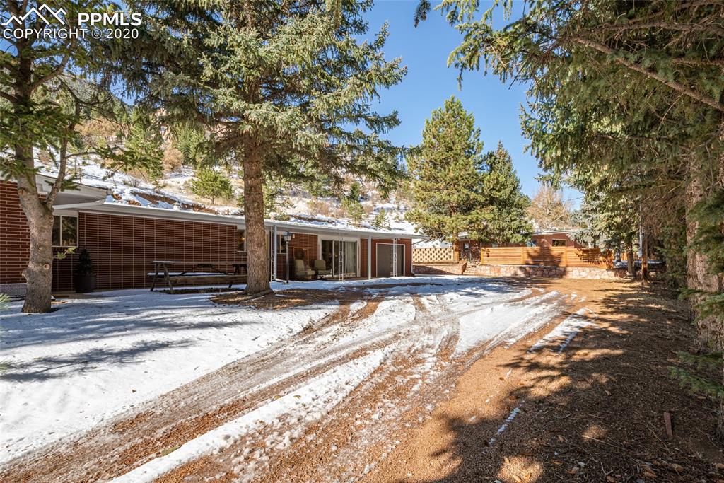 8715 Chipita Park Road Cascade, CO 80809 - Photo 2 of 33 Front view from driveway