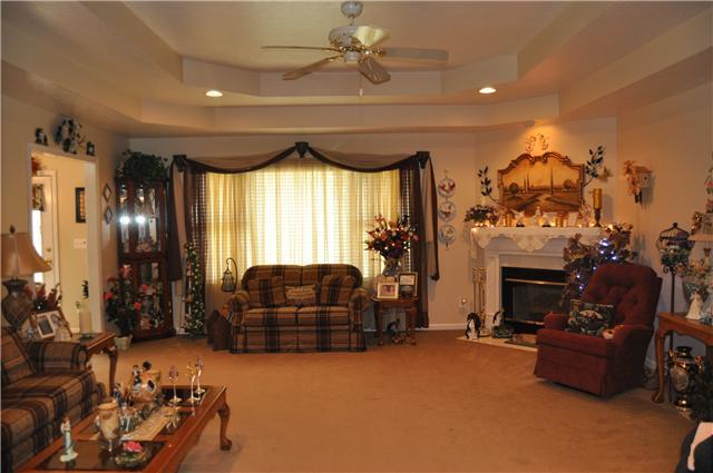 806 Pickney Road Winchester, TN 37398 - Photo 10 of 24 Living Room has a gas log fireplace and Trey ceilings.