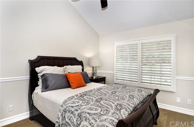 7 Estates Drive Villa Park, CA 92861 - Photo 23 of 46 Bedroom three with ceiling fan, chair railing and vaulted ceiling.