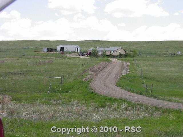 3 bed 2 bath ranch style home on nearly 40 acres with stucco exterior, domestic well, open floor plan, large master with walk in closet a adjoining bath, large country kitchen, gas heat, FP stubbed for gas log.