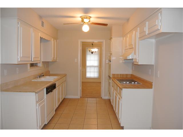 5974 Fox Ridge Drive Memphis, TN 38115 - Photo 2 of 16 Updated kitchen with tile flooring, cook top, double oven, and dishwasher.