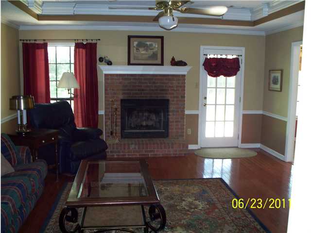 Hardwood floors (not laminate). Recessed vaulted ceiling.