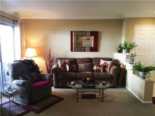 13939 Midland Road Poway, CA 92064 - Photo 2 of 14 Relax after your busy day in your open, light and bright family room with sliding glass door to your patio.
