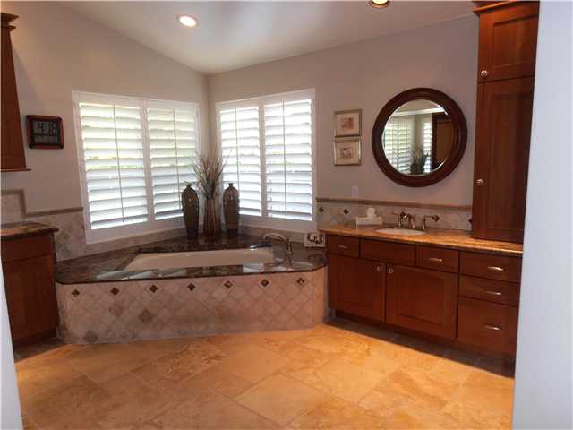 16170 Country Day Road Poway, CA 92064 - Photo 16 of 25 LUXURIOUS AND SPACIOUS MASTER BATH ROOM WITH MARBLE, TILE DUAL SINKS AND TOWER-CHERRY WOOD CABINETS WINDOW WITH SHUTTERS