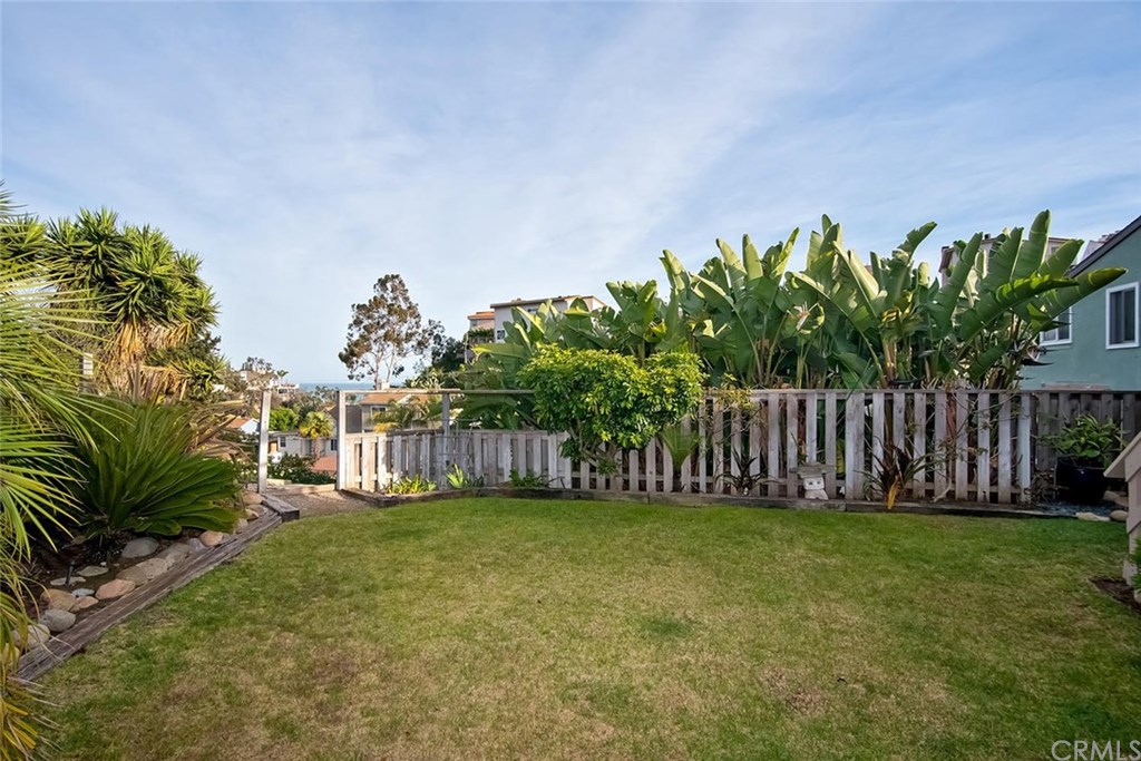 34096 El Contento Dana Point, CA 92629 - Photo 28 of 43 Truly a rare and amazing opportunity to own a quintessential Lantern Village beach bungalow situated atop one of the largest LOTS in the area with OCEAN and Whitewater vistas!