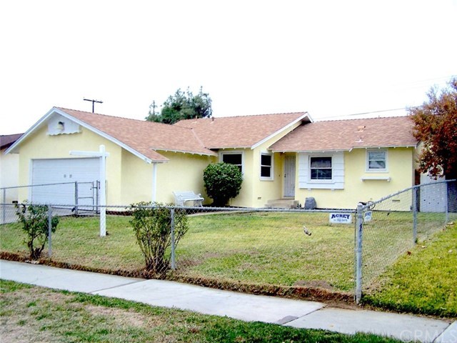 8537 Colorado Avenue Riverside, CA 92504 - Photo 1 of 1 Front View Newly Painted exterior. Fenced yard with auto lawn sprinklers..