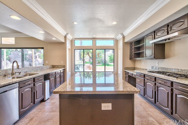 3086 Diamondview Circle Corona, CA 92882 - Photo 30 of 66 The granite in the kitchen is brand new and never used. The cabinets were just re-stained as well.