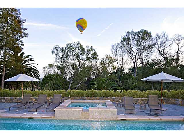 6003 La Flecha Rancho Santa Fe, CA 92067 - Photo 11 of 15 A private backyard is full of trees. Open Views display beautiful hot air balloons when the winds are blowing just right.