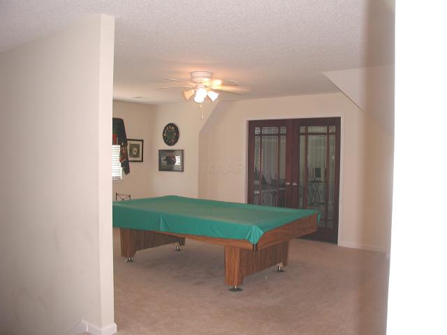 485 Tribal Woods Road Collierville, TN 38017 - Photo 9 of 9 Two great rooms! One for a playroom with tons of space for toys, pool table, crafts. The other behind the beautiful bevelled glass doors is perfect for home office or better yet a Media Room for Friday night movies.