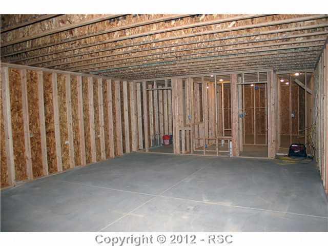 18765 Shiloh Ranch Drive Colorado Springs, CO 80908 - Photo 6 of 8 Framed for 20x30 workshop, full bath, office & tack room with in-floor tubing for radiant floor heat.