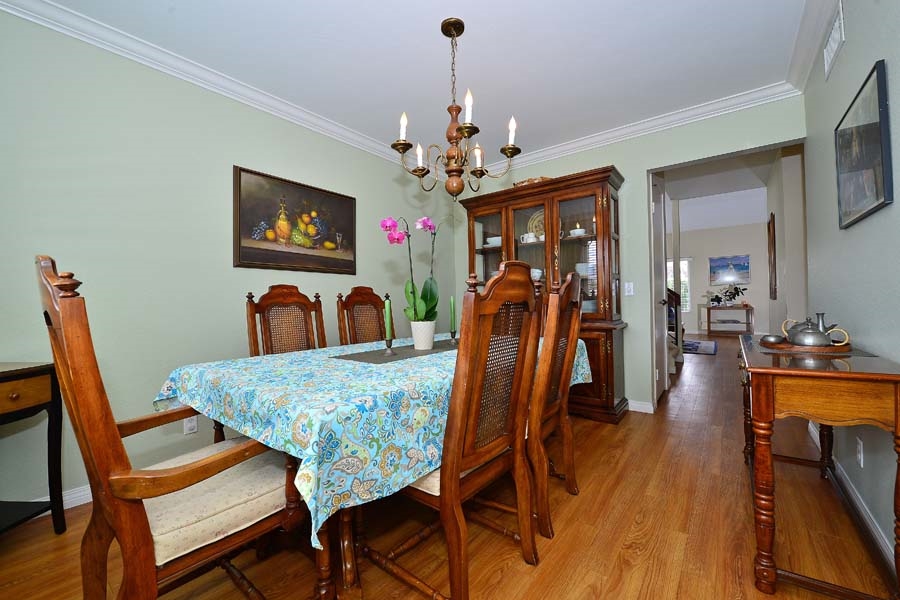 3003 Gayla Court Spring Valley, CA 91978 - Photo 6 of 25 The dining room is wonderful for holidays and special meals with friends and family. It easily accommodates a table for six, plus hutch and side table.