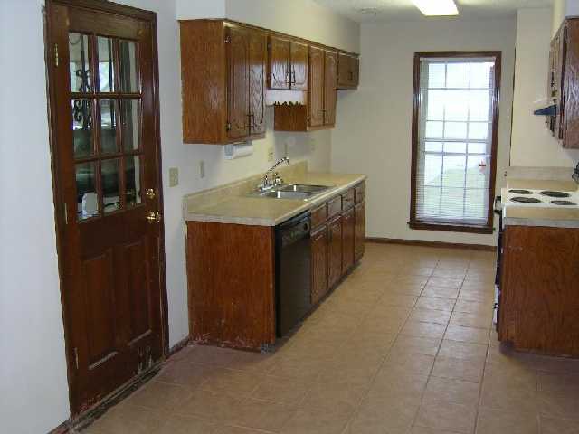 3305 Coleman Road Memphis, TN 38128 - Photo 2 of 7 New ceramic tile, NEW counters, nice wood cabinets, NEW dishwasher.