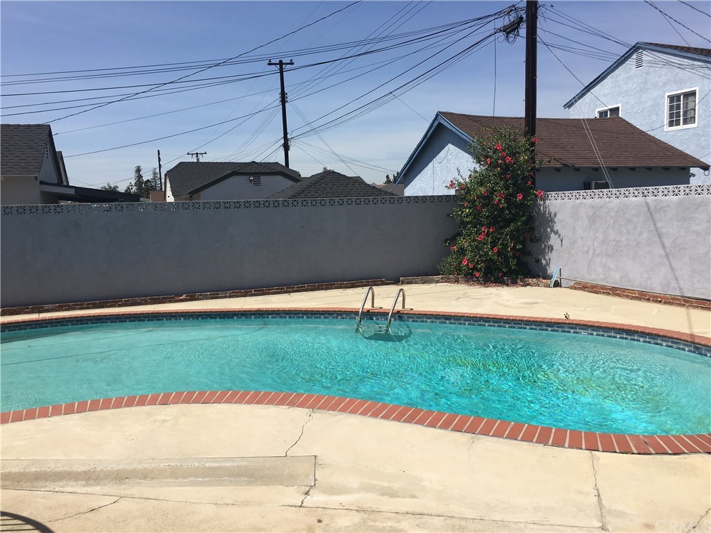 565 East Benbow Street Covina, CA 91722 - Photo 8 of 12 Pool is behind rod iron fence
