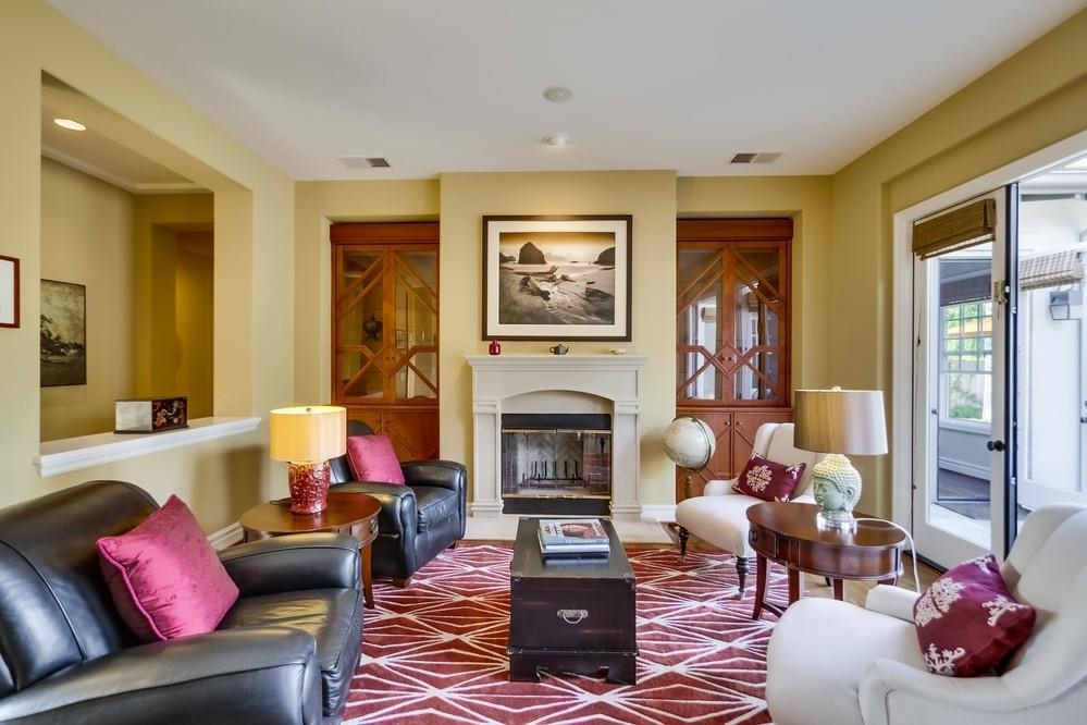736 Caudor Street Encinitas, CA 92024 - Photo 5 of 25 Living Room with built in Light up Cherry Wood Curio Cabinets