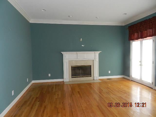 1104 Richmond Road Watertown, TN 37184 - Photo 8 of 24 Formal living room with fireplace and hardwood floors.