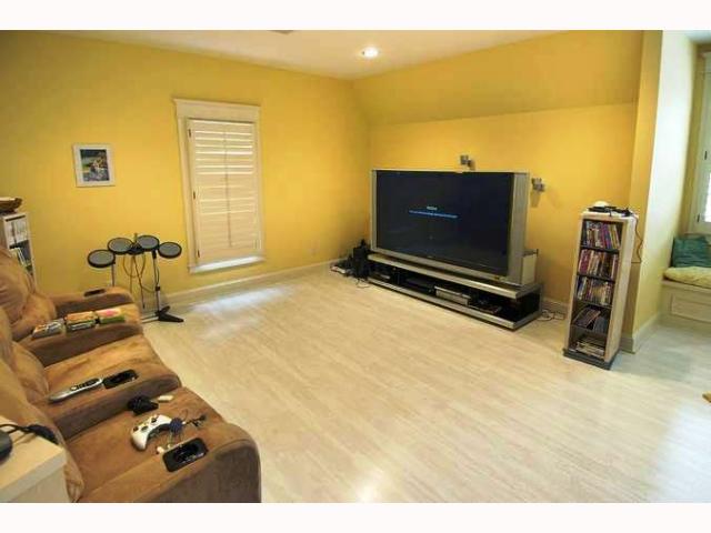 7334 McVay Road Germantown, TN 38138 - Photo 8 of 12 Fabulous gameroom with custom adjustable built-in's, Lovely window seat, exercise area plus TV and game area's. Rear stairs brings you right to gameroom. Room is 2-3 times what you see here!