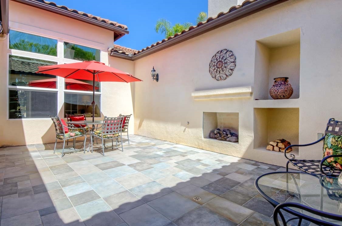 2883 Rancho Cortes Carlsbad, CA 92009 - Photo 6 of 22 Atrium showing fireplace
