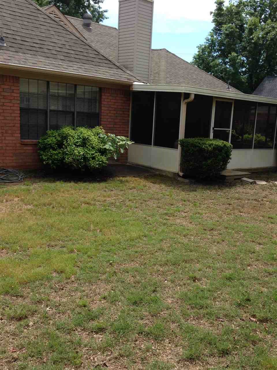 585 South Collierville Arlington Road Collierville, TN 38017 - Photo 2 of 8 Great 12'x15' screened porch to enjoy morning coffee or iced tea in the afternoon! Large trees in back yard give nice shade!