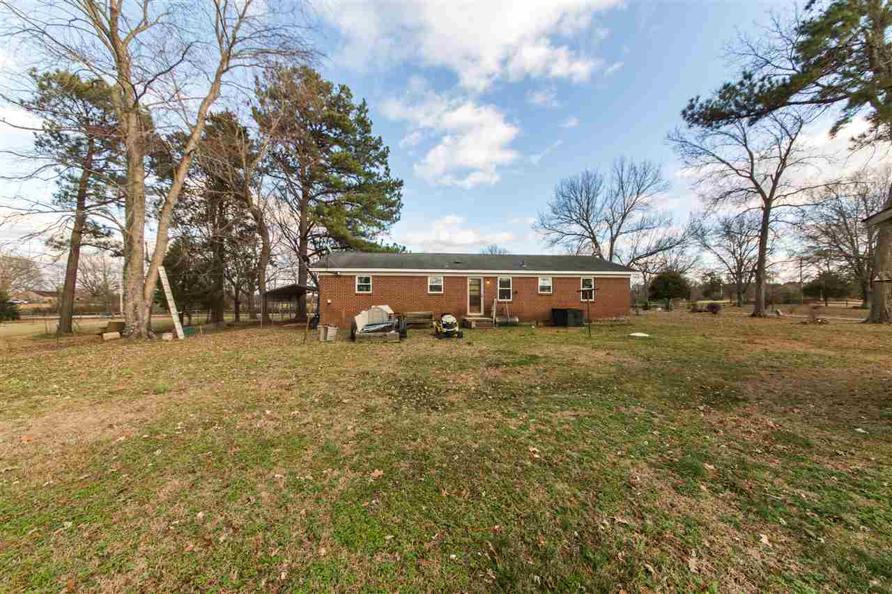 265 Belmont Road Mason, TN 38049 - Photo 4 of 14 Low maintenance brick exterior and ample room on this property.