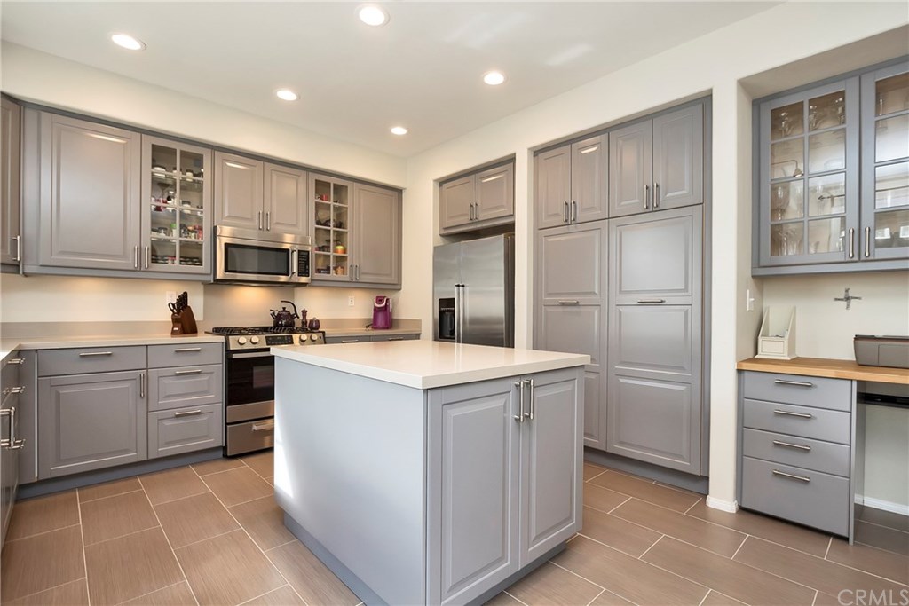 12 Bancroft Street Ladera Ranch, CA 92694 - Photo 1 of 1 Newly remodeled kitchen features gorgeous gray cabinets, contemporary tile floors and quartz counters.