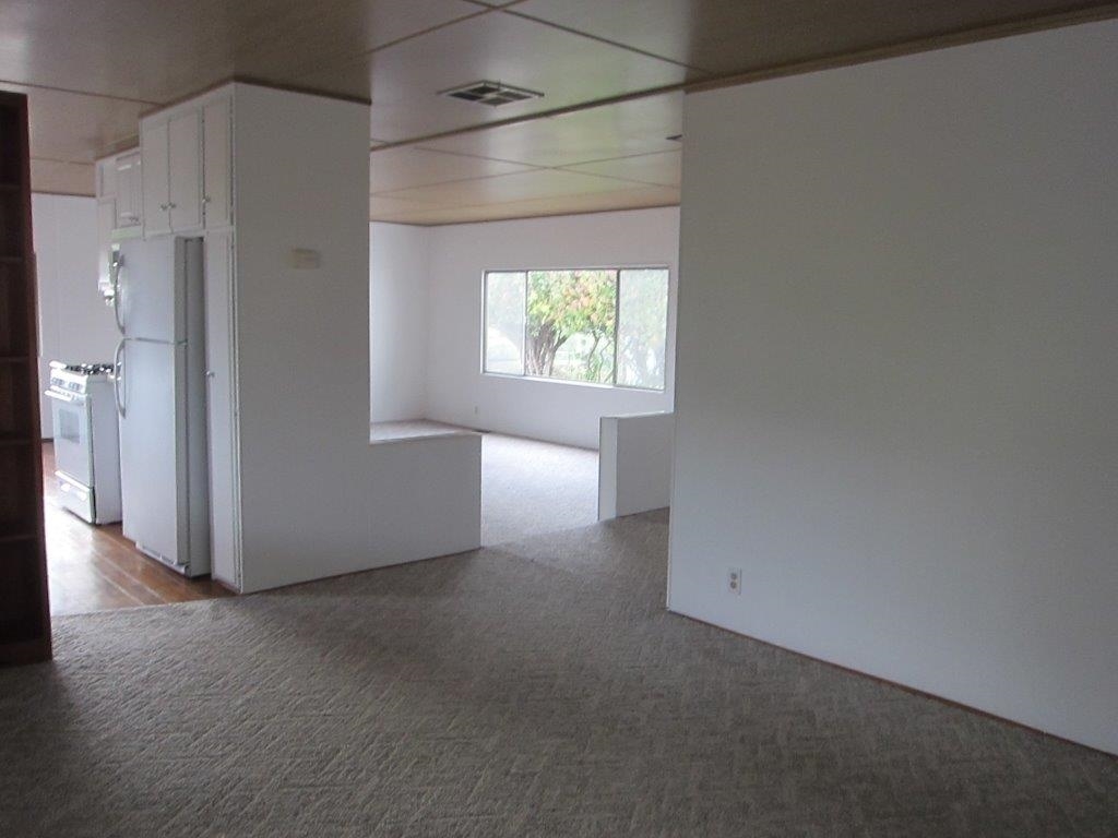 1925 Otay Lakes Road, Unit 87 Chula Vista, CA 91913 - Photo 25 of 25 Very open floor plan because this was a model home. This view is from the dining room/office looking into the living room and kitchen.