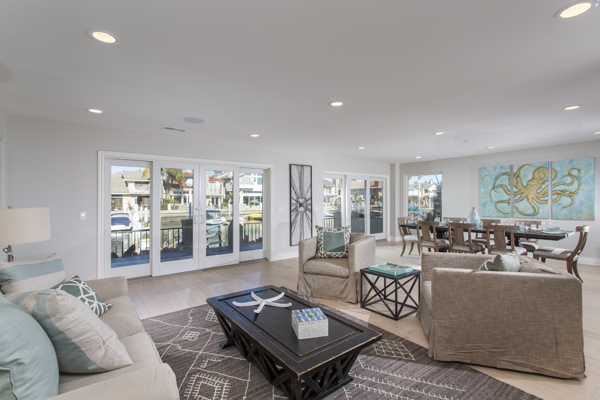 48 Spinnaker Way Coronado, CA 92118 - Photo 3 of 24 Both Living and Dining rooms are on the water with Views!