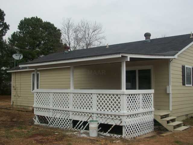1381 Brammer Road Mason, TN 38049 - Photo 2 of 4 relax on this covered deck and enjoy the view