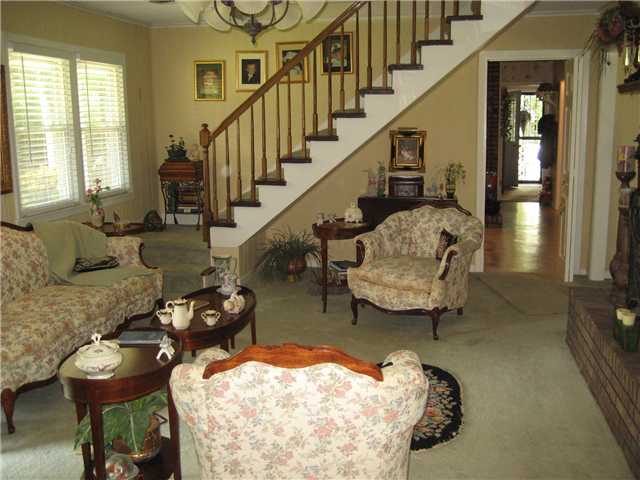 6025 McKinstry Road Moscow, TN 38057 - Photo 6 of 12 Stair case leading up to HUGE Game Room with its own full bath.