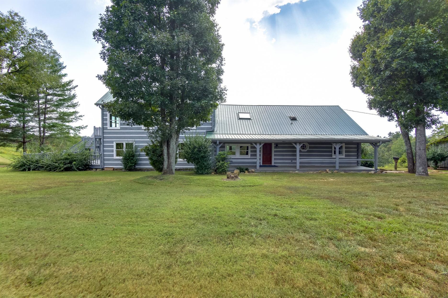 294 Ed Harris Road Ashland City, TN 37015 - Photo 2 of 45 FRONT VIEW OF LOG HOME