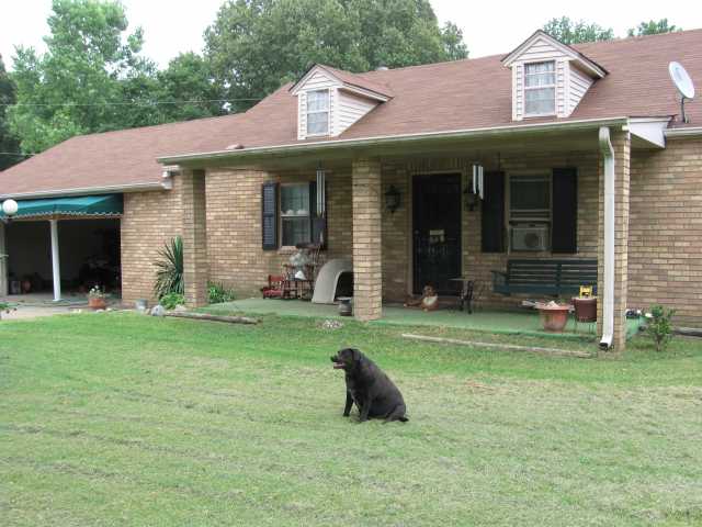 6344 North Watkins Road Millington, TN 38053 - Photo 1 of 12 Front porch of this house that sits up on a hill and catches a nice breeze