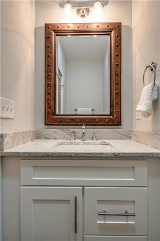 4620 Heath Road Nashville, TN 37221 - Photo 16 of 30 There is a powder room downstairs just off the living room & as we move downstairs.....