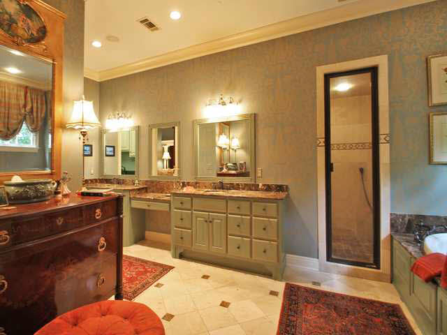 210 Waring Road Memphis, TN 38117 - Photo 12 of 25 Walk-in steam shower, whirlpool tub, two oversized walk in closets, Travertine floors and touch screen tv/ security / music mounted in the wall to make early mornings a little easier to get your day started.