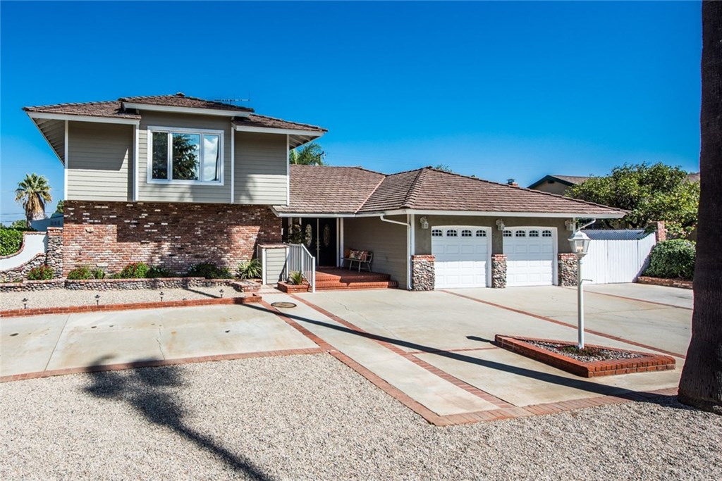 2001 Cypress Point Drive Corona, CA 92882 - Photo 2 of 62 Attractive curb appeal with circular driveway and extensive use of brick