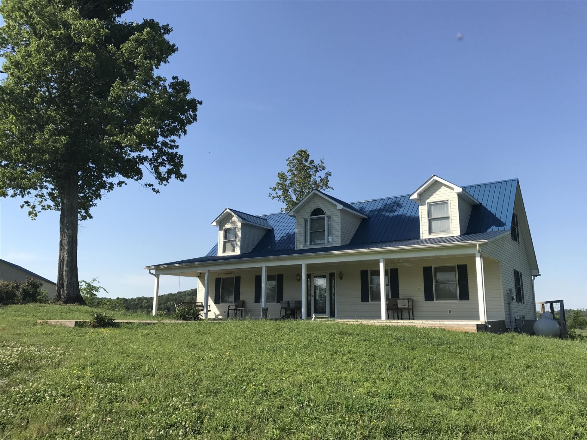 348 Kelso-Smithland Road Kelso, TN 37348 - Photo 2 of 43 What more could you want?! A house on a hill with a bluff view of the water. Ahhh.... how tranquil.