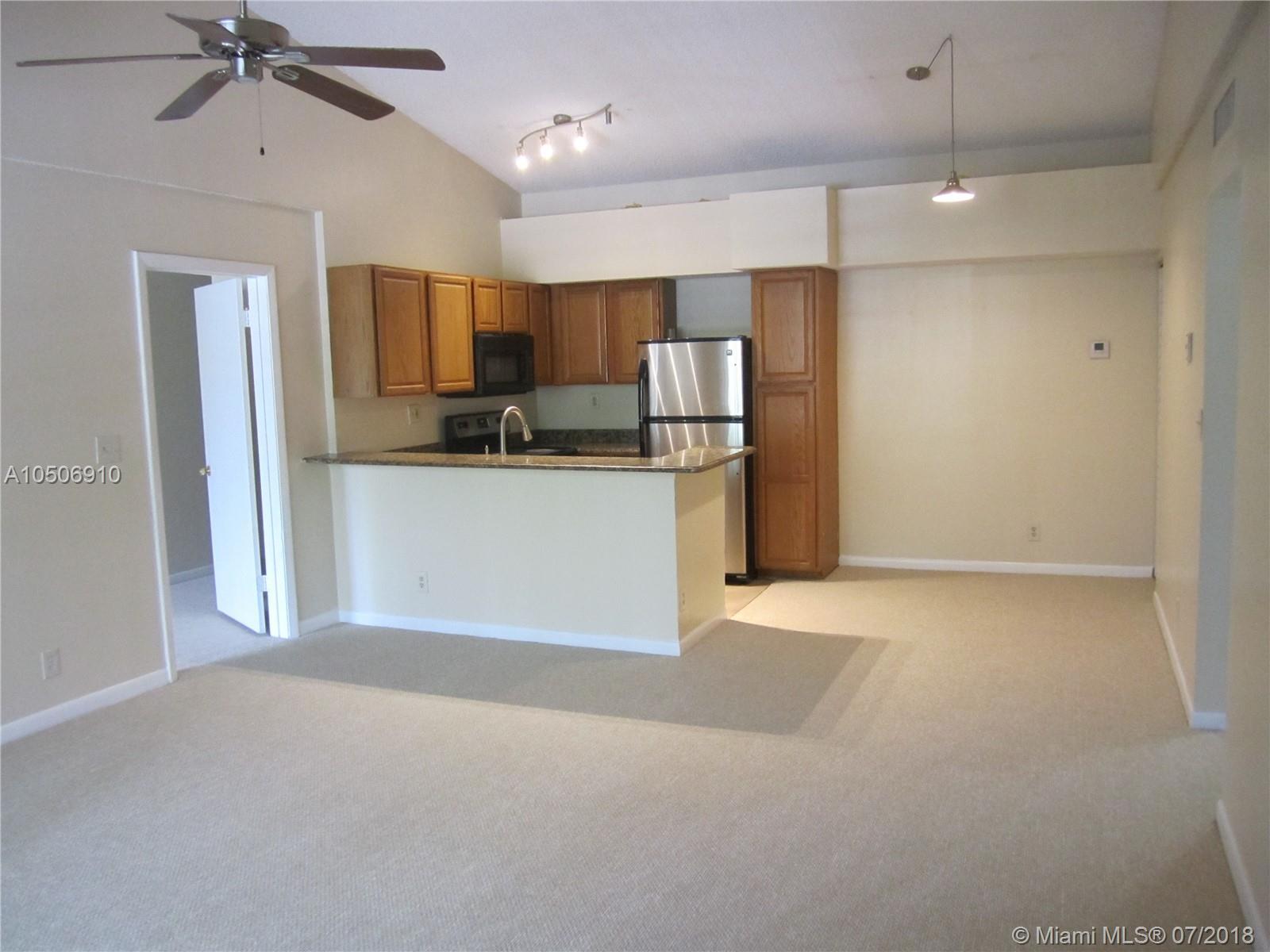 831 Lyons Road, Unit 23205 Coconut Creek, FL 33063 - Photo 2 of 21