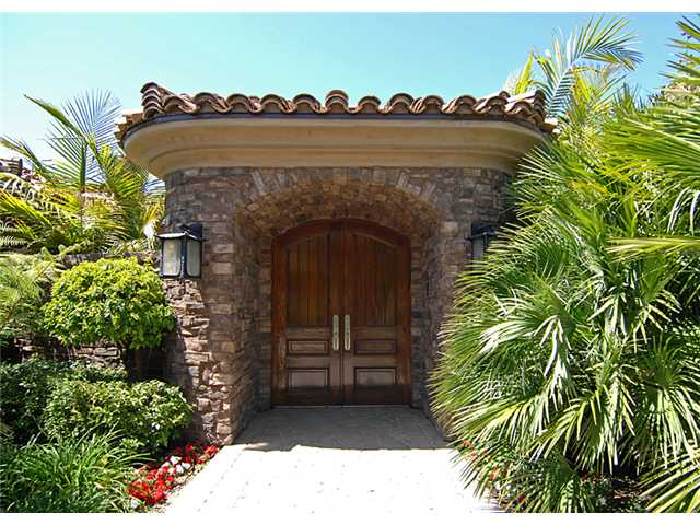 6890 St Andrews Road Rancho Santa Fe, CA 92067 - Photo 12 of 15 The front doors to the homes large front patio.