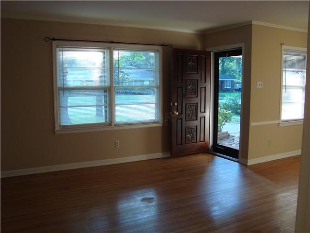 1640 Marcia Road Memphis, TN 38117 - Photo 9 of 12 Hardwood flooring in most rooms. Beautiful wood door at entry.